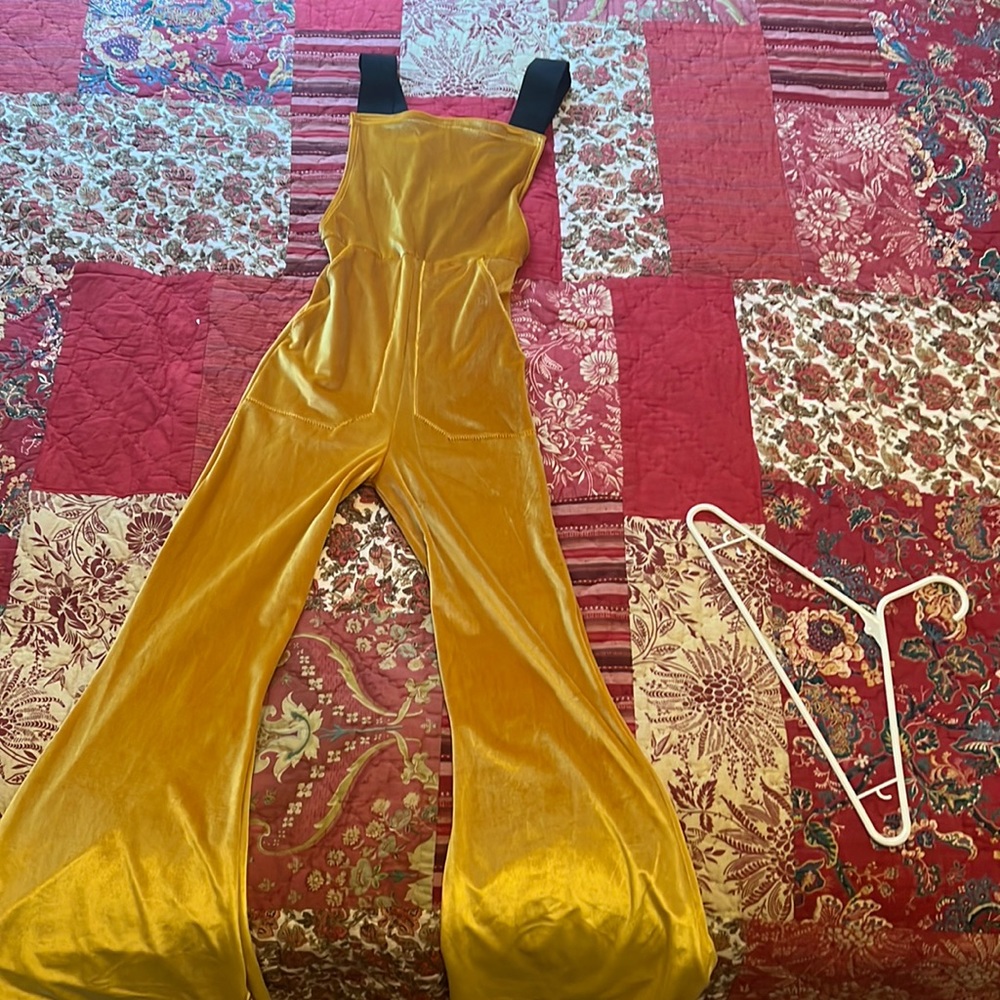 Yellow 70s styler bell bottom jumpsuit